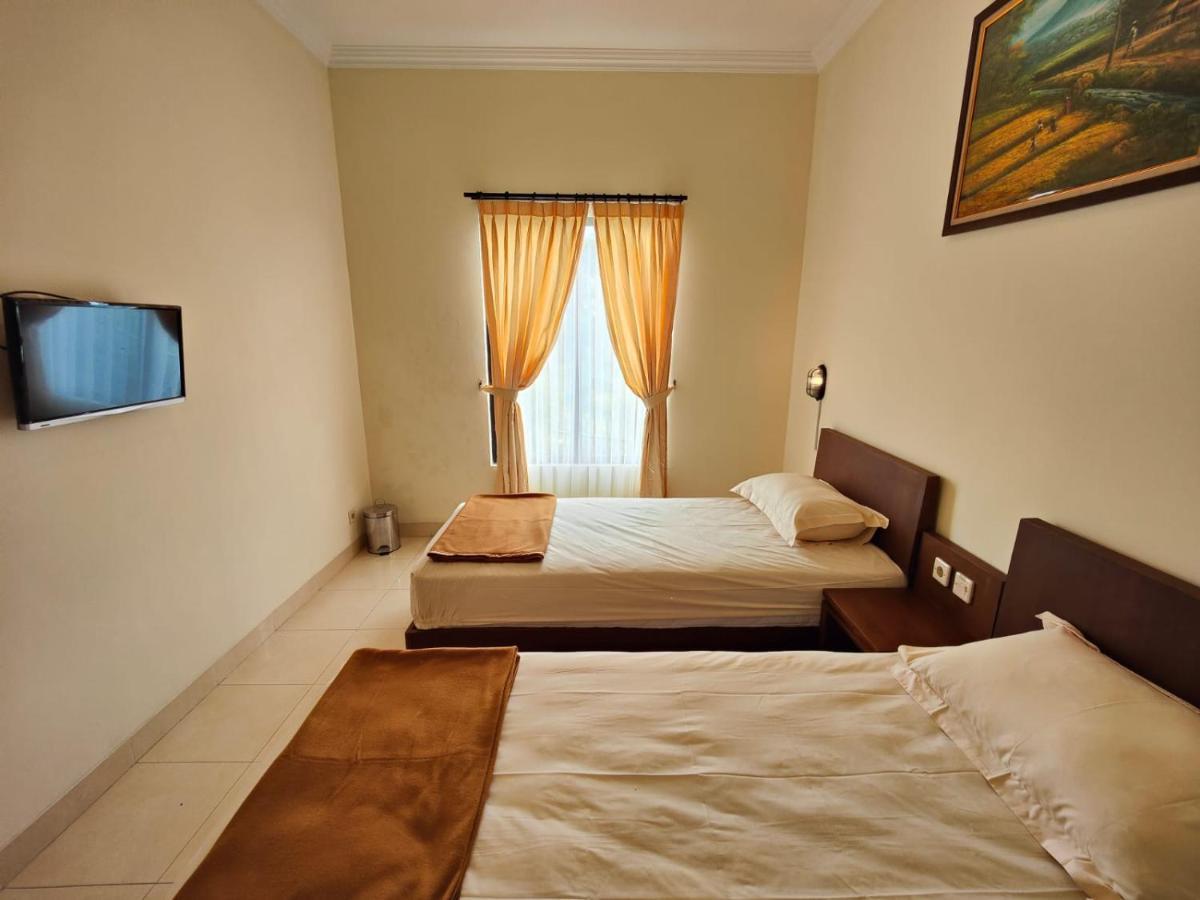 Adiputra Guesthouse 2 By Homiq Ngabean Eksteriør billede
